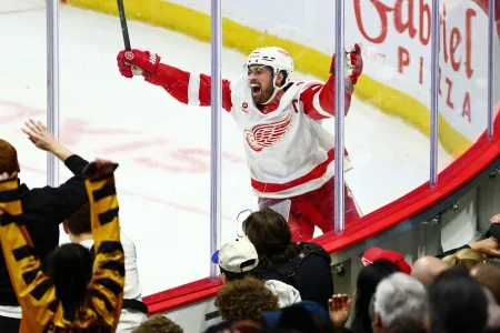Feb 26, 2026; Ottawa, Ontario, CAN; Detroit Red Wings center Dylan Larkin (71) celebrates after scoring in overtime against the Ottawa Senators at Canadian Tire Centre.