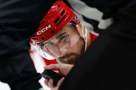 Nov 15, 2025; Detroit, Michigan, USA; Detroit Red Wings center Dylan Larkin (71) gets set to face off in the second period against the Buffalo Sabres at Little Caesars Arena.