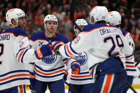 Apr 24, 2026; Anaheim, California, USA; Edmonton Oilers center Connor McDavid (second from left) celebrates with teammates after scoring a a power play goal during the third period against the Anaheim Ducks in game three of the first round of the 2026 Stanley Cup Playoffs at Honda Center.