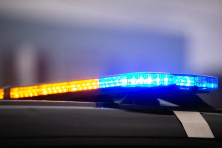 A Corpus Christi police vehicles sirens light up on Agnes Street in Corpus Christi, Texas, on Jan. 23, 2026.