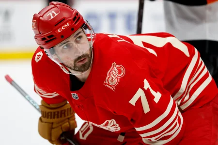 Mar 28, 2026; Detroit, Michigan, USA; Detroit Red Wings center Dylan Larkin (71) gets set to face off in the second period against the Philadelphia Flyers at Little Caesars Arena