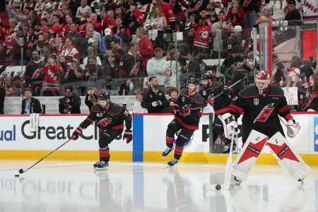 Jun 4, 2026; Raleigh, North Carolina, USA; Carolina Hurricanes goaltender Frederik Andersen (31) and center Sebastian Aho (20) and right wing Andrei Svechnikov (37) enter the ice for warms up before a game against the Vegas Golden Knights in game two of the 2026 Stanley Cup Final at Lenovo Center.
