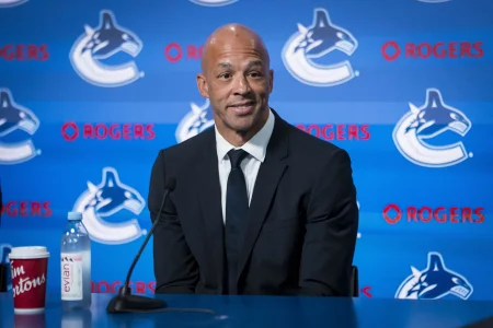 Jun 4, 2026; Vancouver, BC, CANADA; Manny Malhotra speaks during press conference where the Vancouver Canucks introduce Malhotra as their new head coach during a press conference at Rogers Arena.