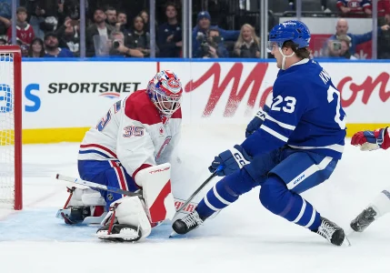 Oct 8, 2025; Toronto, Ontario, CAN; Toronto Maple Leafs left wing Matthew Knies (23) battles in front of Montreal Canadiens goaltender Sam Montembeault (35) during the third period at Scotiabank Arena. Oct 8, 2025; Toronto, Ontario, CAN; Toronto Maple Leafs left wing Matthew Knies (23) battles in front of Montreal Canadiens goaltender Sam Montembeault (35) during the third period at Scotiabank Arena.