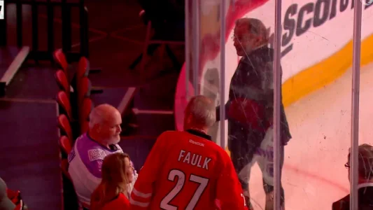 Hurricanes fan makes a bold gesture towards John Tortorella that causes a reaction