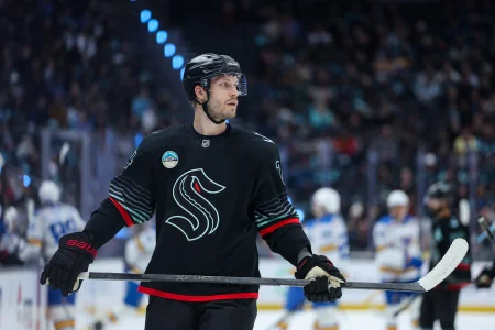 Mar 4, 2026; Seattle, Washington, USA; Seattle Kraken defenseman Jamie Oleksiak (24) looks on in the third period against the St. Louis Blues at Climate Pledge Arena. Mar 4, 2026; Seattle, Washington, USA; Seattle Kraken defenseman Jamie Oleksiak (24) looks on in the third period against the St. Louis Blues at Climate Pledge Arena.