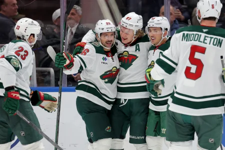 The Minnesota Wild and Calgary Flames have made a three-player trade