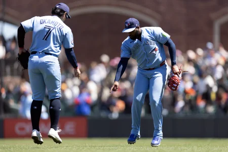 Jul 8, 2026; San Francisco, California, USA; Toronto Blue Jays third baseman Kazuma Okamoto (7) and first baseman Vladimir Guerrero Jr. (27) celebrate their 10-0 victory over the San Francisco Giants at Oracle Park
