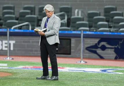 Apr 2, 2025; Toronto, Ontario, CAN; Toronto Blue Jays TV announcer Buck Martinez on the field before the game between the Washington Nationals at Rogers Centre. Apr 2, 2025; Toronto, Ontario, CAN; Toronto Blue Jays TV announcer Buck Martinez on the field before the game between the Washington Nationals at Rogers Centre.