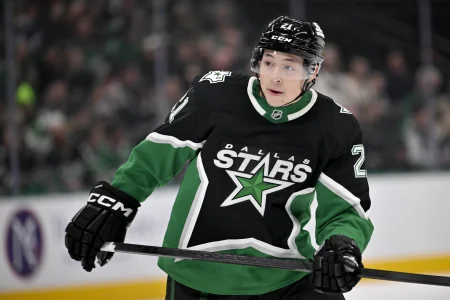 Dec 21, 2025; Dallas, Texas, USA; Dallas Stars left wing Jason Robertson (21) skates against the Toronto Maple Leafs during the second period at the American Airlines Center. Mandatory Credit: Jerome Miron-Imagn Images