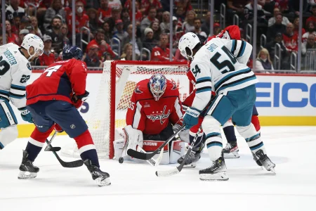 Oct 29, 2023; Washington, District of Columbia, USA; Washington Capitals goaltender Darcy Kuemper (35) makes a save against San Jose Sharks right wing Givani Smith (54) during the second period at Capital One Arena.