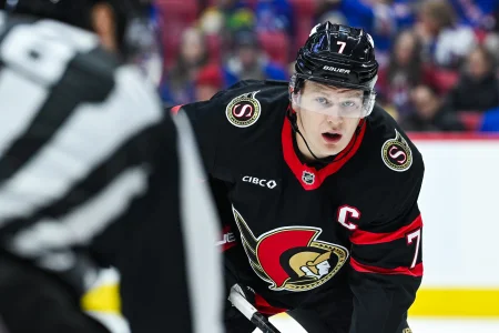 Dec 4, 2025; Ottawa, Ontario, CAN; Ottawa Senators left wing Brady Tkachuk (7) waits for a face-off against the New York Rangersduring the first period at Canadian Tire Centre.