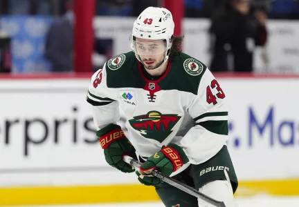 Quinn Hughes mourns a loss, where his family's hockey story began