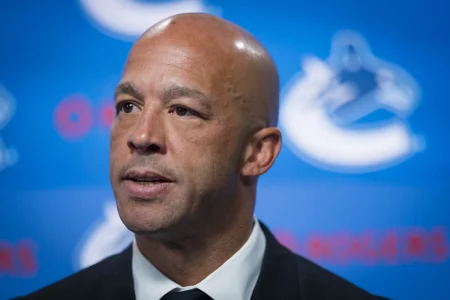 Jun 4, 2026; Vancouver, BC, CANADA; Manny Malhotra speaks during press conference where the Vancouver Canucks introduce Malhotra as their new head coach during a press conference at Rogers Arena