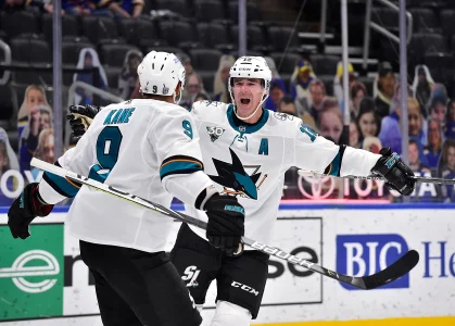 Marleau (12) celebrates with left wing Evander Kane (9) after scoring a goal during the second period against the St. Louis Blues at Enterprise Center.