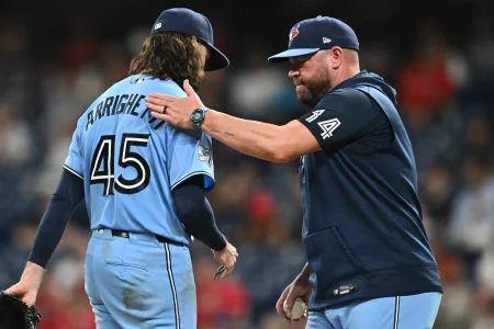 Sep 1, 2026; Cleveland, Ohio, USA; Toronto Blue Jays manager John Schneider (14) relives pitcher Spencer Arrighetti (45) during the sixth inning against the Cleveland Guardians at Progressive Field Sep 1, 2026; Cleveland, Ohio, USA; Toronto Blue Jays manager John Schneider (14) relives pitcher Spencer Arrighetti (45) during the sixth inning against the Cleveland Guardians at Progressive Field