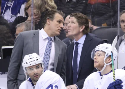 Mar 11, 2019; Toronto, Ontario, CAN; Toronto Maple Leafs assistant coach Jim Hiller talks to head coach Mike Babcock on the bench in the third period against the Tampa Bay Lightning at Scotiabank Arena. The Lightning beat the Maple Leafs 6-2.