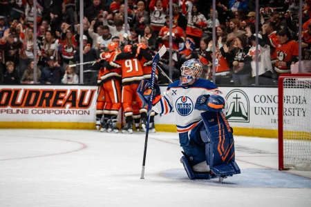 Apr 26, 2026; Anaheim, California, USA; Anaheim Ducks celebrate a goal while Edmonton Oilers goaltender Tristan Jarry (35) looks at the replay during the second period in game four of the first round of the 2026 Stanley Cup Playoffs at Honda Center.