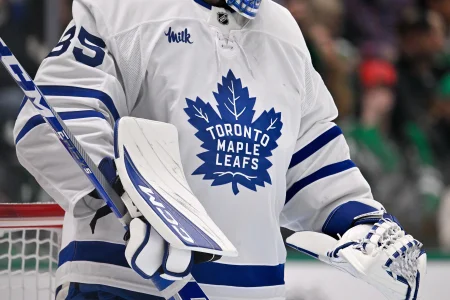 Dec 21, 2025; Dallas, Texas, USA; A view of the logo on the jersey of Toronto Maple Leafs goaltender Dennis Hildeby (35) during the game at the American Airlines Center. Dec 21, 2025; Dallas, Texas, USA; A view of the logo on the jersey of Toronto Maple Leafs goaltender Dennis Hildeby (35) during the game at the American Airlines Center.