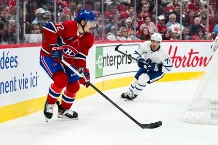 Sep 19, 2026; Montreal, Quebec, CAN; Montreal Canadiens Arber Xhekaj defenseman (72) plays the puck behind the net against the Toronto Maple Leafs during the first period at Bell Centre. Mandatory Credit: David Kirouac-Imagn Images