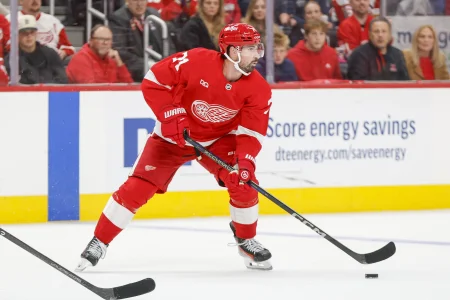 Oct 6, 2026; Detroit, Michigan, USA; Detroit Red Wings center Dylan Larkin (71) handles the puck during the second period against the Ottawa Senators at Little Caesars Arena.