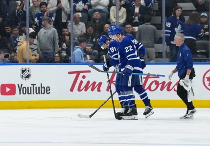 Oct 15, 2026; Toronto, Ontario, CAN; Toronto Maple Leafs center John Tavares (91) is helped off the ice by defenseman Jake McCabe (22) against the Buffalo Sabres during the third period at Scotiabank Arena. Oct 15, 2026; Toronto, Ontario, CAN; Toronto Maple Leafs center John Tavares (91) is helped off the ice by defenseman Jake McCabe (22) against the Buffalo Sabres during the third period at Scotiabank Arena.