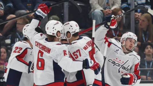 Mar 26, 2026; Salt Lake City, Utah, USA; The Washington Capitals celebrate a goal against the Utah Mammoth by left wing Ivan Miroshnichenko (63) during the first period at Delta Center.