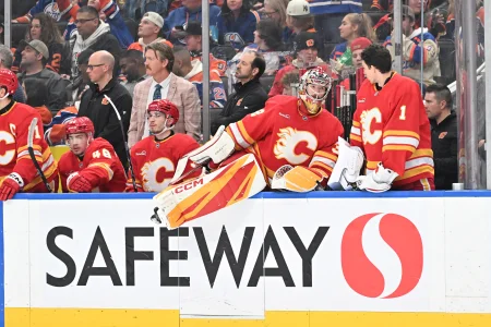 Flames' Devin Cooley injured after Dach collision as MCL speculation and timeline emerge
