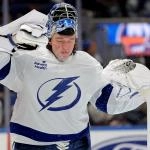 Dec 2, 2025; Elmont, New York, USA; Tampa Bay Lightning goaltender Andrei Vasilevskiy (88) sprays water on his face during the second period against the New York Islanders at UBS Arena. Mandatory Credit: Brad Penner-Imagn Images