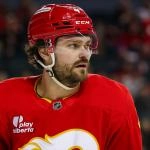 Jan 17, 2026; Calgary, Alberta, CAN; Calgary Flames defenseman Rasmus Andersson (4) against the New York Islanders during the third period at Scotiabank Saddledome. Mandatory Credit: Sergei Belski-Imagn Images