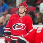Dec 29, 2025; Raleigh, North Carolina, USA; Carolina Hurricanes defensemen Gavin Bayreuther (25) looks on during the warmups before the game against the New York Rangers at Lenovo Center.