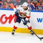 Jun 14, 2025; Edmonton, Alberta, CAN; Florida Panthers center Aleksander Barkov (16) controls the puck against the Edmonton Oilers during the second period in game five of the 2025 Stanley Cup Final at Rogers Place.