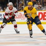 Jan 22, 2026; Nashville, Tennessee, USA; Nashville Predators defenseman Roman Josi (59) skates with the puck against the Ottawa Senators during the third period at Bridgestone Arena.