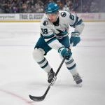 Jan 7, 2026; Los Angeles, California, USA; San Jose Sharks defenseman Vincent Iorio (22) moves the puck against the Los Angeles Kings during the third period at Crypto.com Arena.