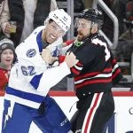 Jan 23, 2026; Chicago, Illinois, USA; Chicago Blackhawks left wing Nick Foligno (17) fights with Tampa Bay Lightning center Jack Finley (62) during the first period at United Center.