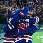[US, Mexico  Canada customers only] Feb 18, 2026; Milan, Italy; Dylan Larkin of United States celebrates with teammates after scoring their first goal against Sweden in a men\'s ice hockey quarterfinal during the Milano Cortina 2026 Olympic Winter Games at Milano Santagiulia Ice Hockey Arena.