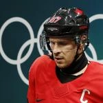 Feb 13, 2026; Milan, Italy; Sidney Crosby of Canada during the warm up before the match against Switzerland in men\'s ice hockey group A play during the Milano Cortina 2026 Olympic Winter Games at Milano Santagiulia Ice Hockey Arena.