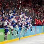 Feb 22, 2026; Milan, Italy; United States bench react after the game-winning goal is scored by Jack Hughes (not pictured) of the United States against Canada in the men\'s ice hockey gold medal game during the Milano Cortina 2026 Olympic Winter Games at Milano Santagiulia Ice Hockey Arena.