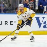 Jan 31, 2026; Elmont, New York, USA; Nashville Predators center Steven Stamkos (91) controls the puck in the first period against the New York Islanders at UBS Arena.