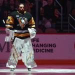 Jan 31, 2026; Pittsburgh, Pennsylvania, USA; Pittsburgh Penguins goaltender Stuart Skinner (74) stands for the national anthem against the New York Rangers at PPG Paints Arena.