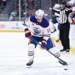 Nov 29, 2025; Seattle, Washington, USA; Edmonton Oilers center Adam Henrique (19) looks to pass in the second period against the Seattle Kraken at Climate Pledge Arena.