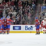 Dec 21, 2024; Montreal, Quebec, CAN; Montreal Canadiens forward Patrik Laine (92) celebrates with teammates including forward Cole Caufield (13) and forward Juraj Slafkovsky (20) and defenseman Lane Hutson (48) and forward Nick Suzuki (14) after scoring a goal against the Detroit Red Wings during the first period at the Bell Centre. Mandatory Credit: Eric Bolte-Imagn Images