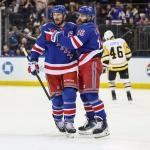 Feb 28, 2026; New York, New York, USA; New York Rangers centers J.T. Miller (8) and Vincent Trocheck (16) celebrate in the second period against the Pittsburgh Penguins at Madison Square Garden. Mandatory Credit: Wendell Cruz-Imagn Images