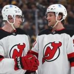 Feb 26, 2026; Pittsburgh, Pennsylvania, USA; New Jersey Devils defenseman Simon Nemec (17) and center Dawson Mercer (91) talk on the ice against the Pittsburgh Penguins during the first period at PPG Paints Arena. Mandatory Credit: Charles LeClaire-Imagn Images