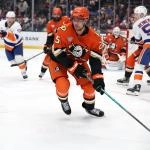 Mar 4, 2026; Anaheim, California, USA; Anaheim Ducks center Ryan Poehling (25) controls the puck during the third period against the New York Islanders at Honda Center.