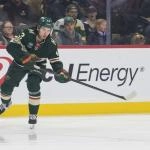 Feb 2, 2026; Saint Paul, Minnesota, USA; Minnesota Wild defenseman Quinn Hughes (43) passes the puck in the defensive zone against the Montreal Canadiens in the first period at Grand Casino Arena.