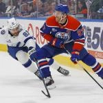 Mar 21, 2026; Edmonton, Alberta, CAN; Edmonton Oilers forward Connor McDavid (97) looks to make a pass in front of Tampa Bay Lightning defensemen Erik Cernak (81) during the first period at Rogers Place. Mandatory Credit: Perry Nelson-Imagn Images