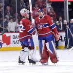 Jan 7, 2026; Montreal, Quebec, CAN; Montreal Canadiens players including goalies Jacob Fowler (32) and Jakub Dobes (75) celebrates the win against the Calgary Flames at the Bell Centre.