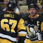 Mar 24, 2026; Pittsburgh, Pennsylvania, USA; Pittsburgh Penguins center Sidney Crosby (87) congratulates right wing Rickard Rakell (67) on his goal against the Colorado Avalancheduring the third period at PPG Paints Arena.