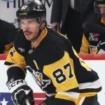 Mar 24, 2026; Pittsburgh, Pennsylvania, USA; Pittsburgh Penguins center Sidney Crosby (87) skates with the puck against the Colorado Avalanche during the second period at PPG Paints Arena. Mandatory Credit: Charles LeClaire-Imagn Images